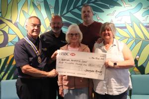 From the left:  President Mike Barker presenting the grant to Zena Maher (far right) supported by Rodney Reed Chair Seaford Rotary Community Service Committee, Penny Stoker, 'Trust Secretary' Seaford Baptist Church and Raoul Maher
